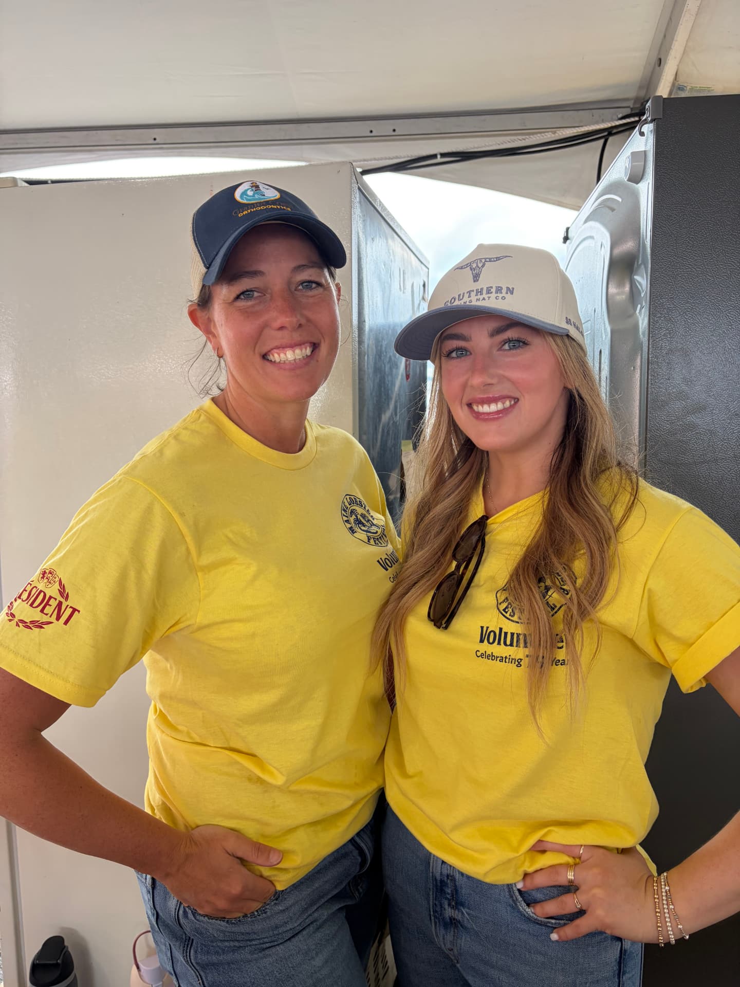 Granite Coast Orthodontics team members in volunteer shirts at the Maine Lobster Festival