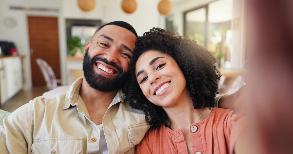 Two people smiling for a photo
